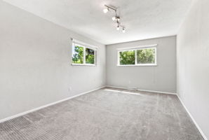 Third upstairs bedroom, flexible as a bedroom, office or guest room. Currently used as an office.