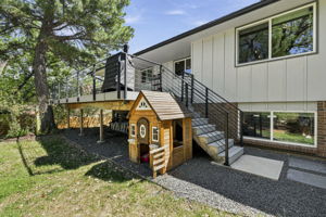 Mature shade trees, open lawn and space to entertain.