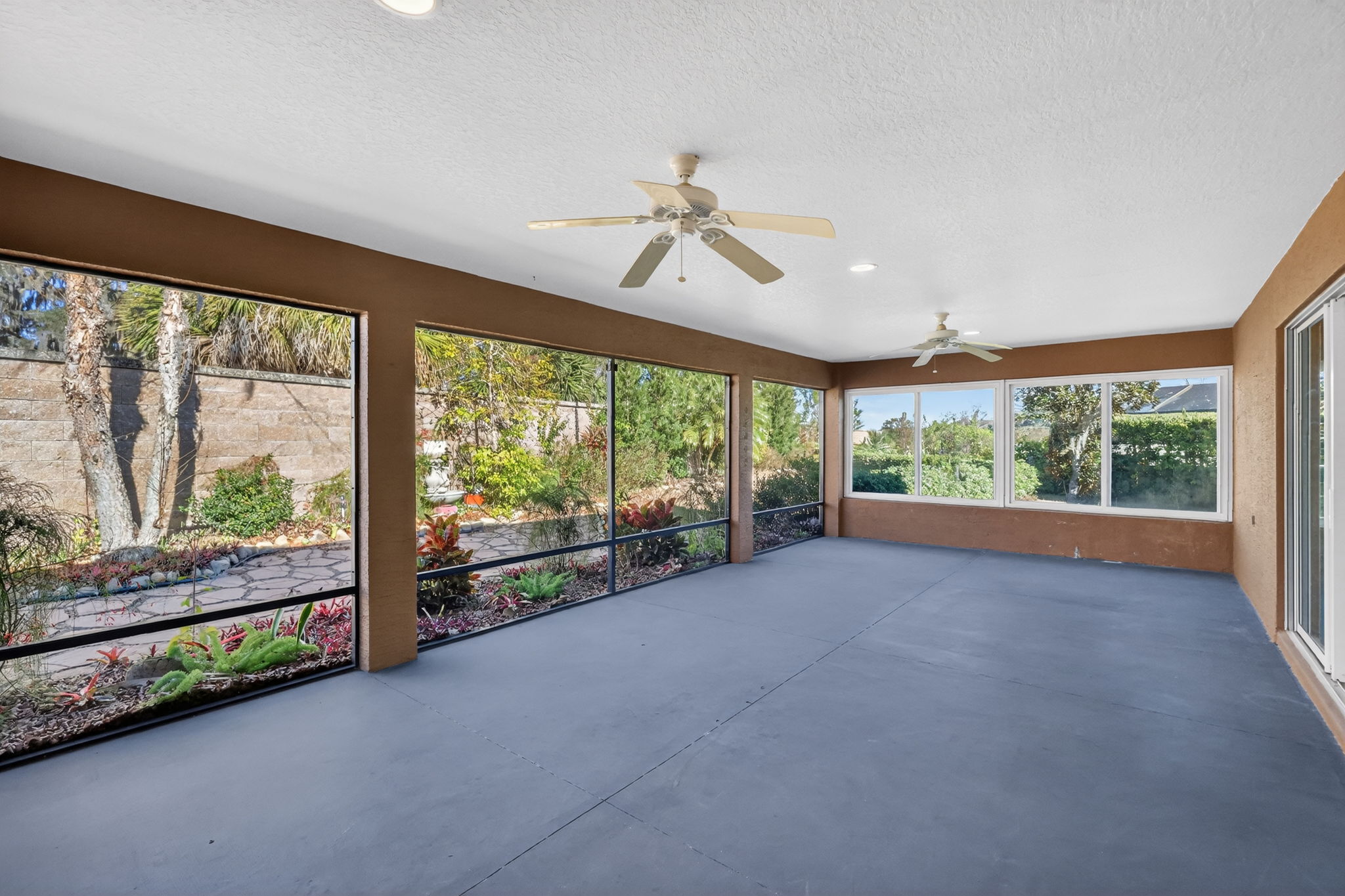 Expansive 30'x15' Lanai with Rear Privacy Wall