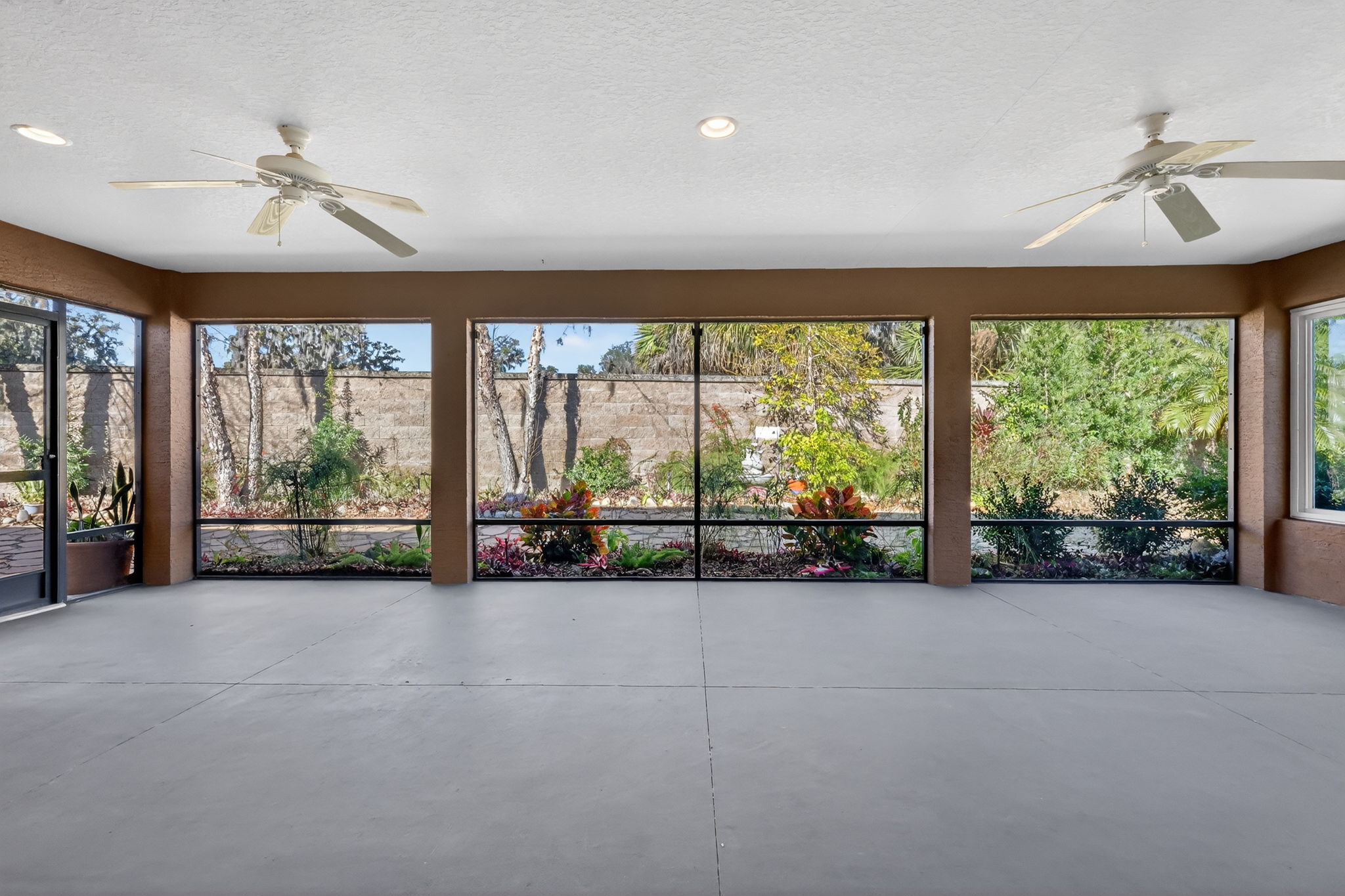 Expansive 30'x15' Lanai with Rear Privacy Wall