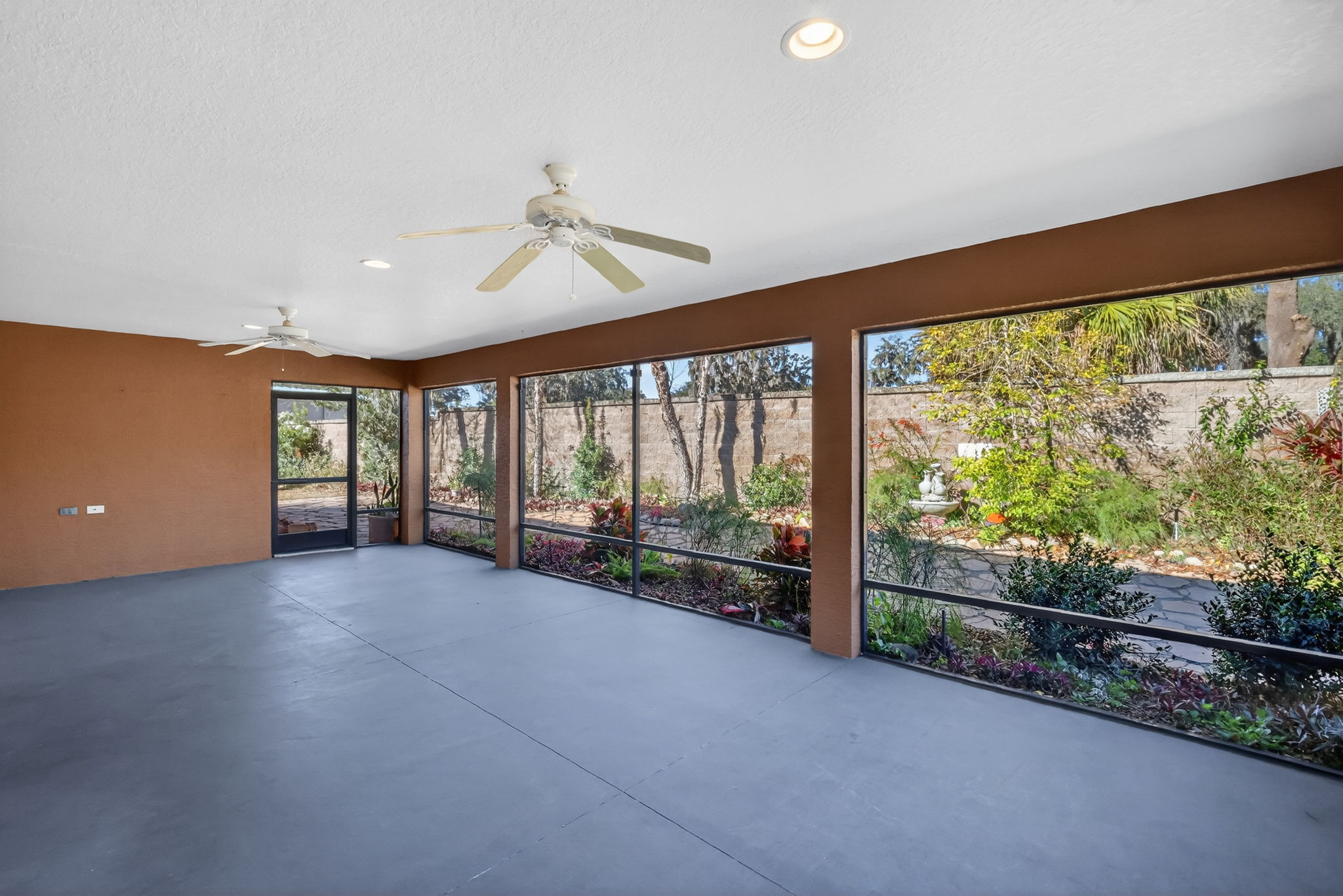 Expansive 30'x15' Lanai with Rear Privacy Wall