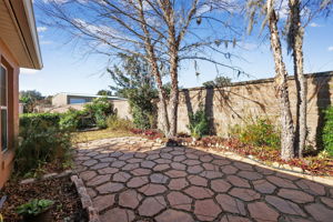 Rear Stoned Patio with Privacy Wall