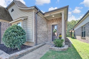 Brick Landscaped Beds & Covered Porch