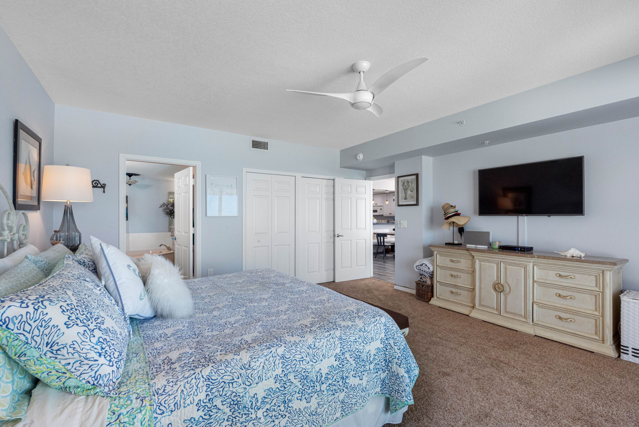 .. His & Hers Closets By White Entry Door.