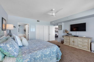 .. His & Hers Closets By White Entry Door.