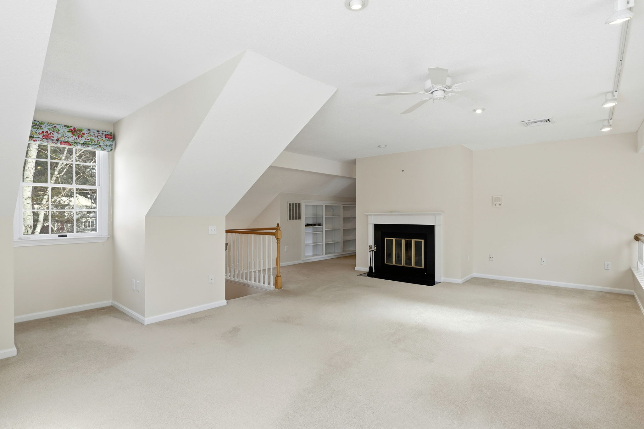 Second Floor Loft III | Fireplace & Custom Shelving/Storage
