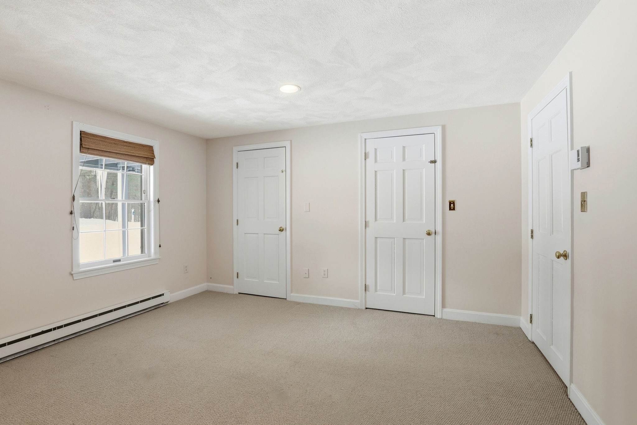 Bedroom 4, Lower Level I | With double closet, walk-in closet & cedar closet