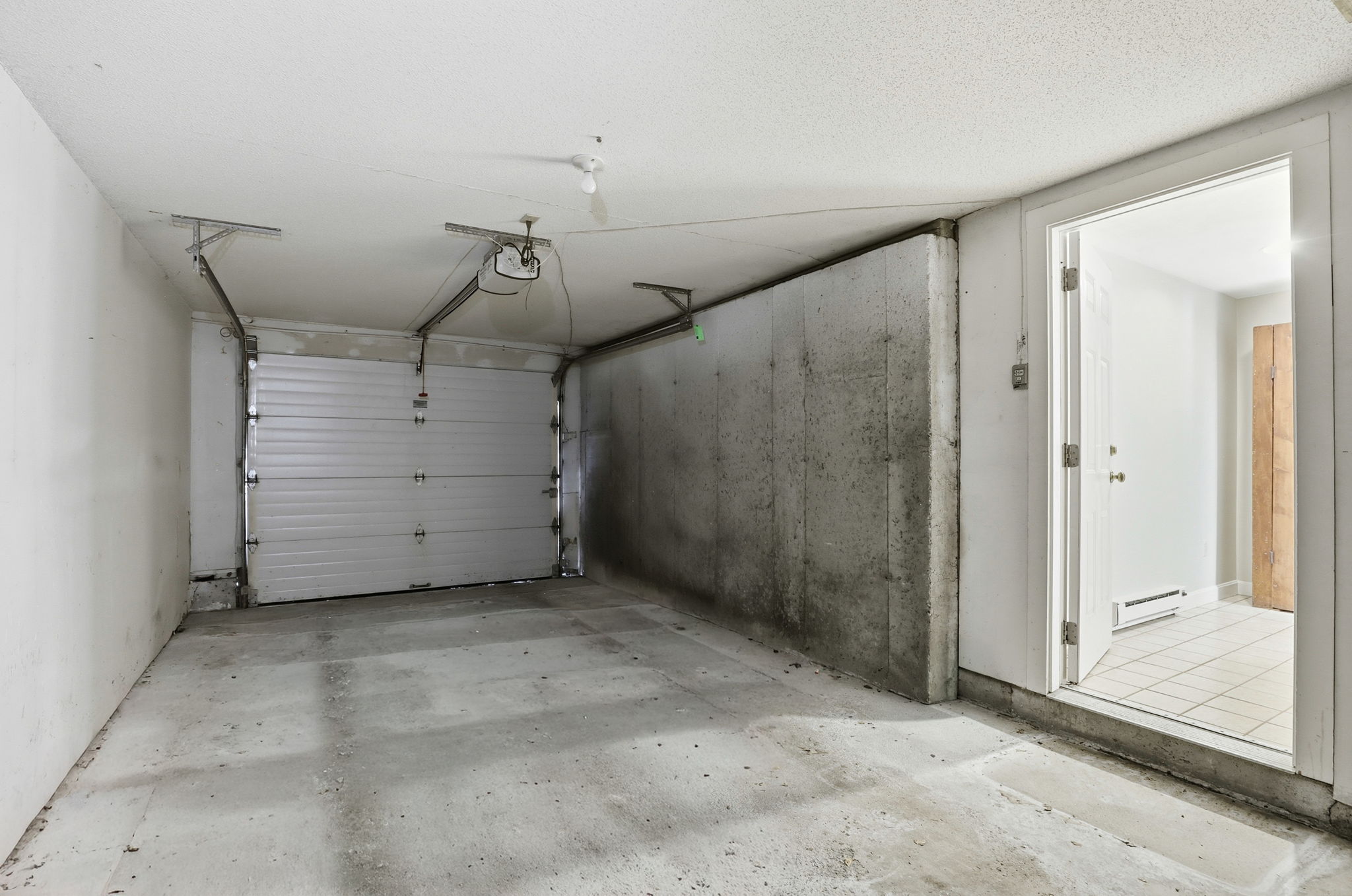 Attached one-car garage with storage