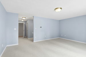 Primary Bedroom Suite II | With custom shelving in double closets & walk-in closet