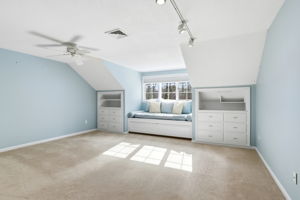 Bedroom 3, Second Floor I | With custom built-ins and window seat with storage