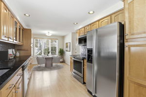 Kitchen & Dining Area I (Virtually Staged)