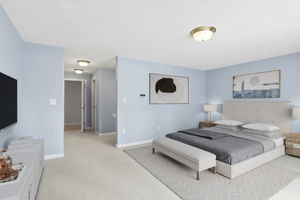 Primary Bedroom Suite II (Virtually Staged) | With custom shelving in double closets & walk-in closet