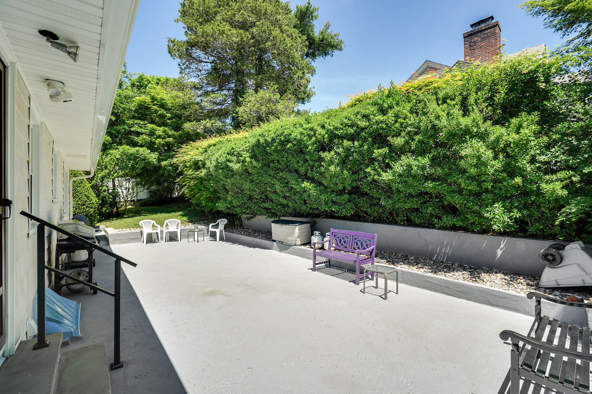 Patio with Evergreens for additional privacy