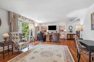 Living Room with abundant natural lighting and hardwood floors