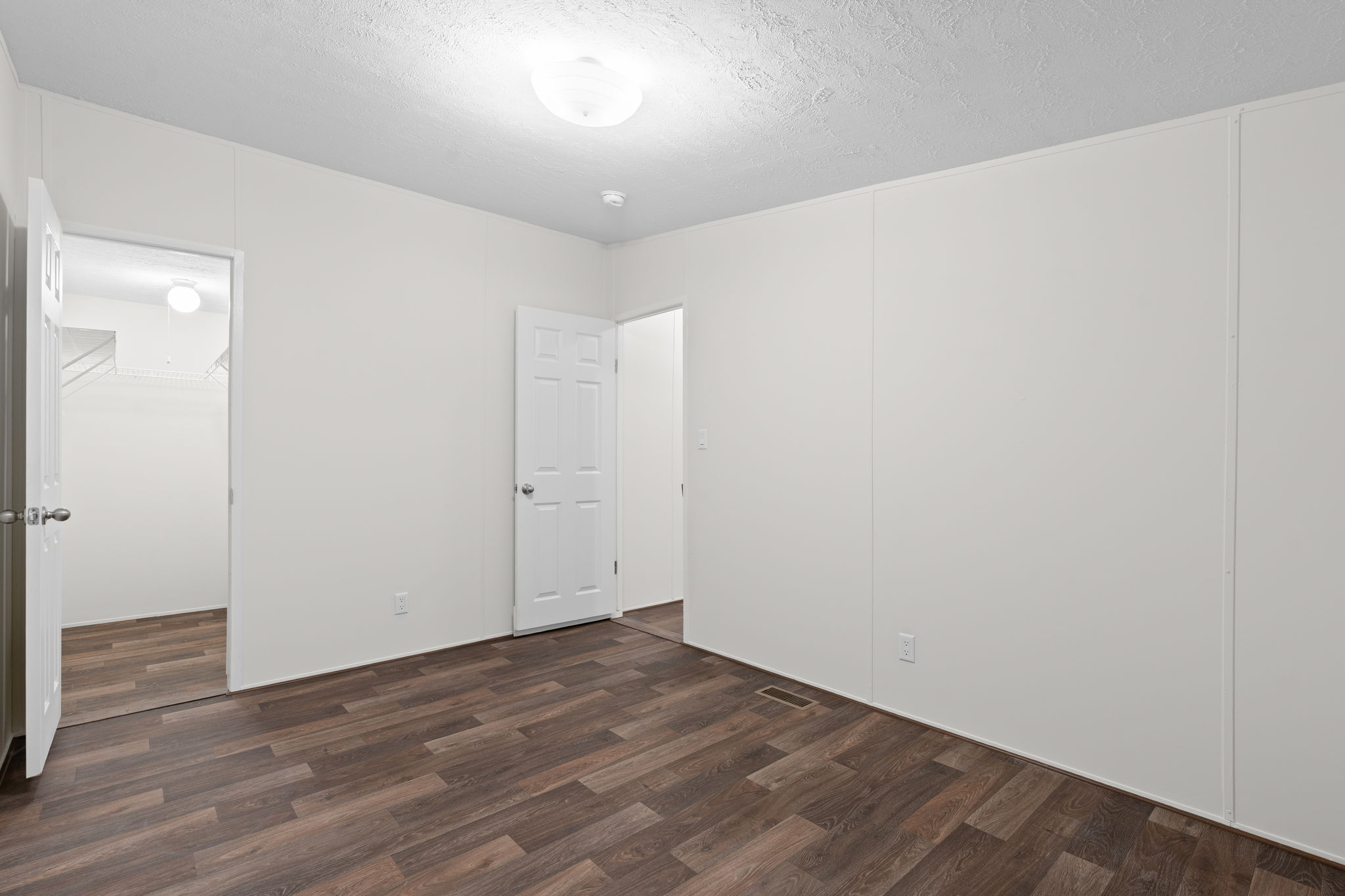 Another perspective of the second bedroom—bright and ready for your personal touch.