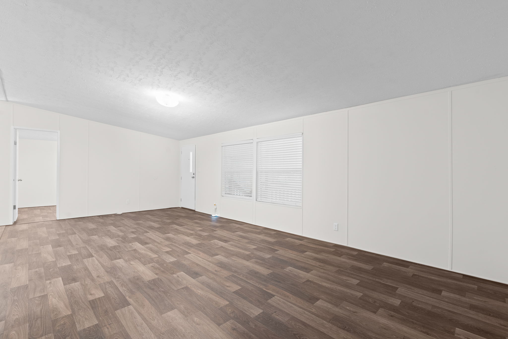 A different view of the living area—simple, functional, and ready to make your own.