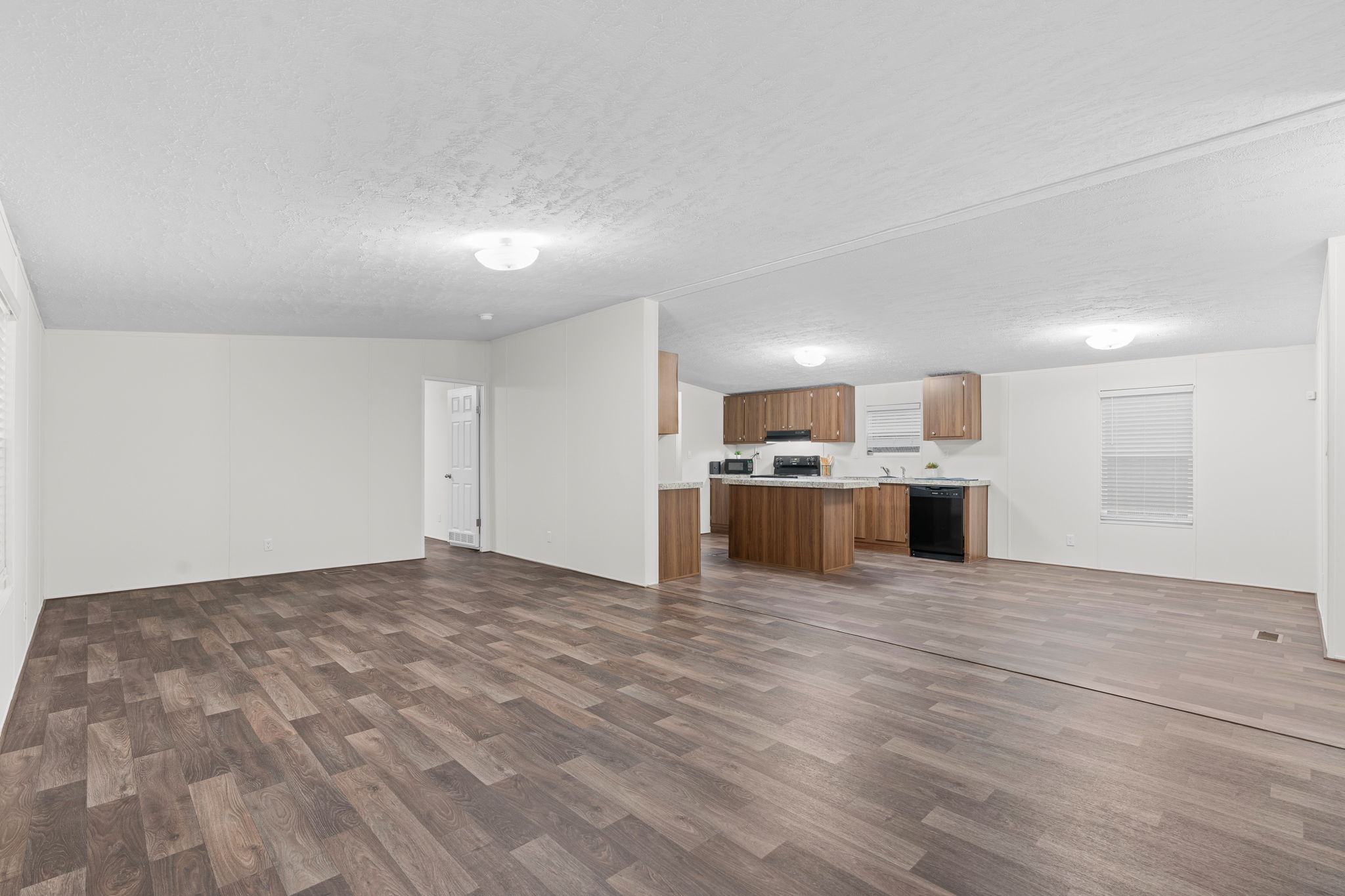 An open-concept living and kitchen area that brings everyone together—whether you're cooking dinner or kicking back, this space just works.
