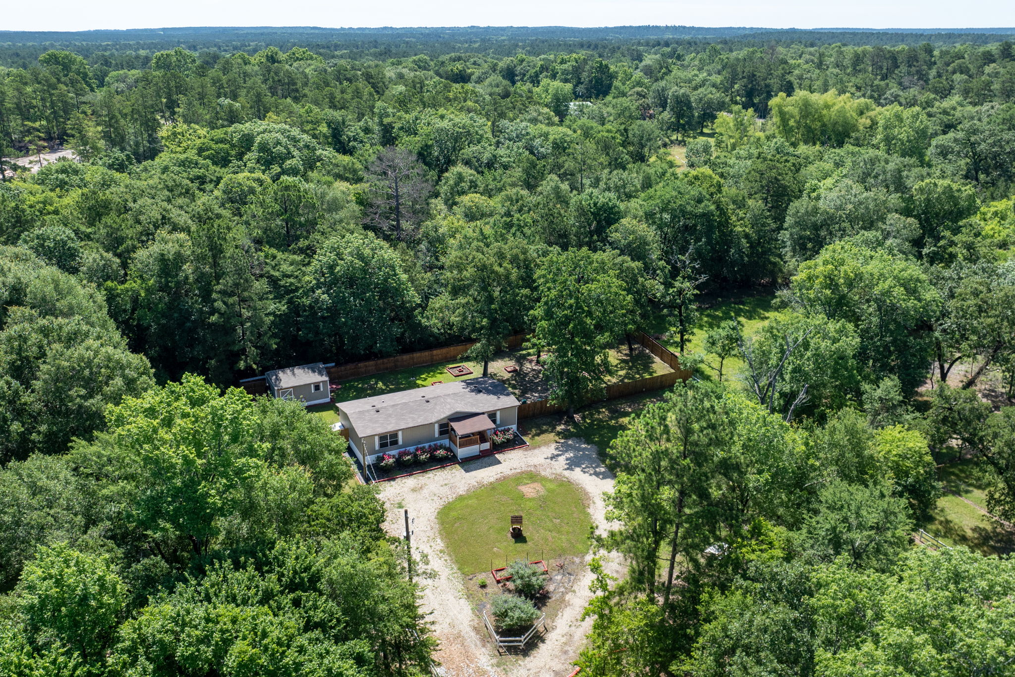 Beautiful rock and gravel driveway that leads straight up to the home—combining charm with easy access.