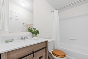 Full bathroom conveniently located for easy access from the bedrooms—functional and straightforward.