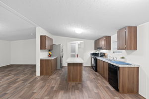 Another angle of the kitchen—showing off its clean layout and easy flow into the main living areas.