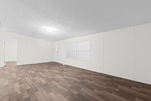 A different view of the living area—simple, functional, and ready to make your own.