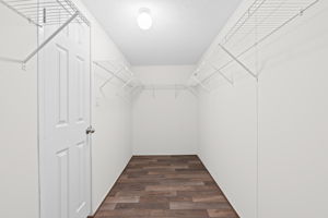 Generous master closet with plenty of space to organize your wardrobe and essentials.