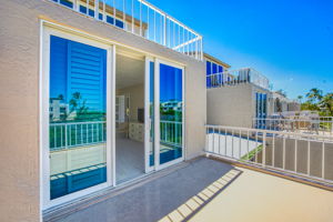 35-Primary-Suite-Deck-to-Condo