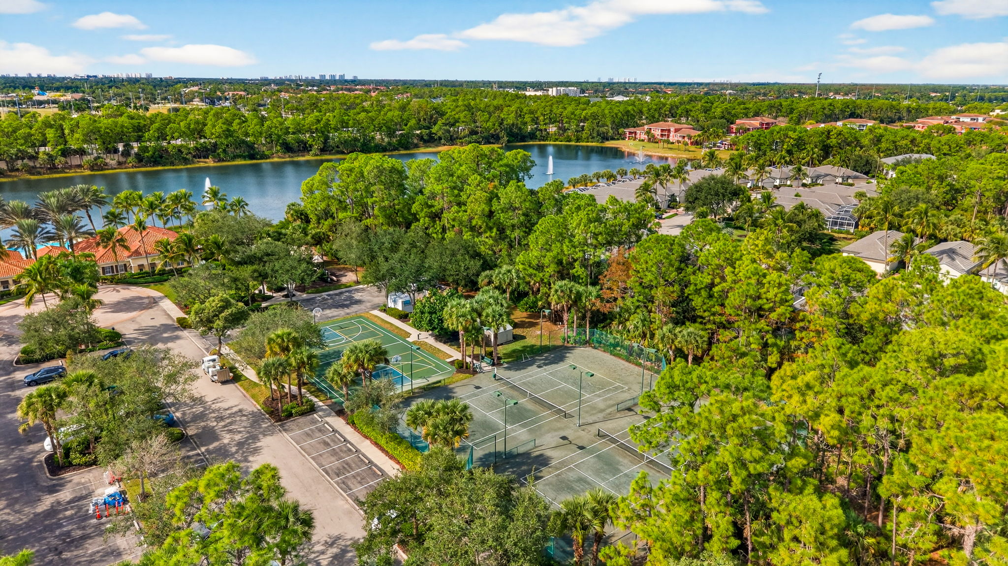 Infiniti pool by lake, tennis, pickleball, volleyball