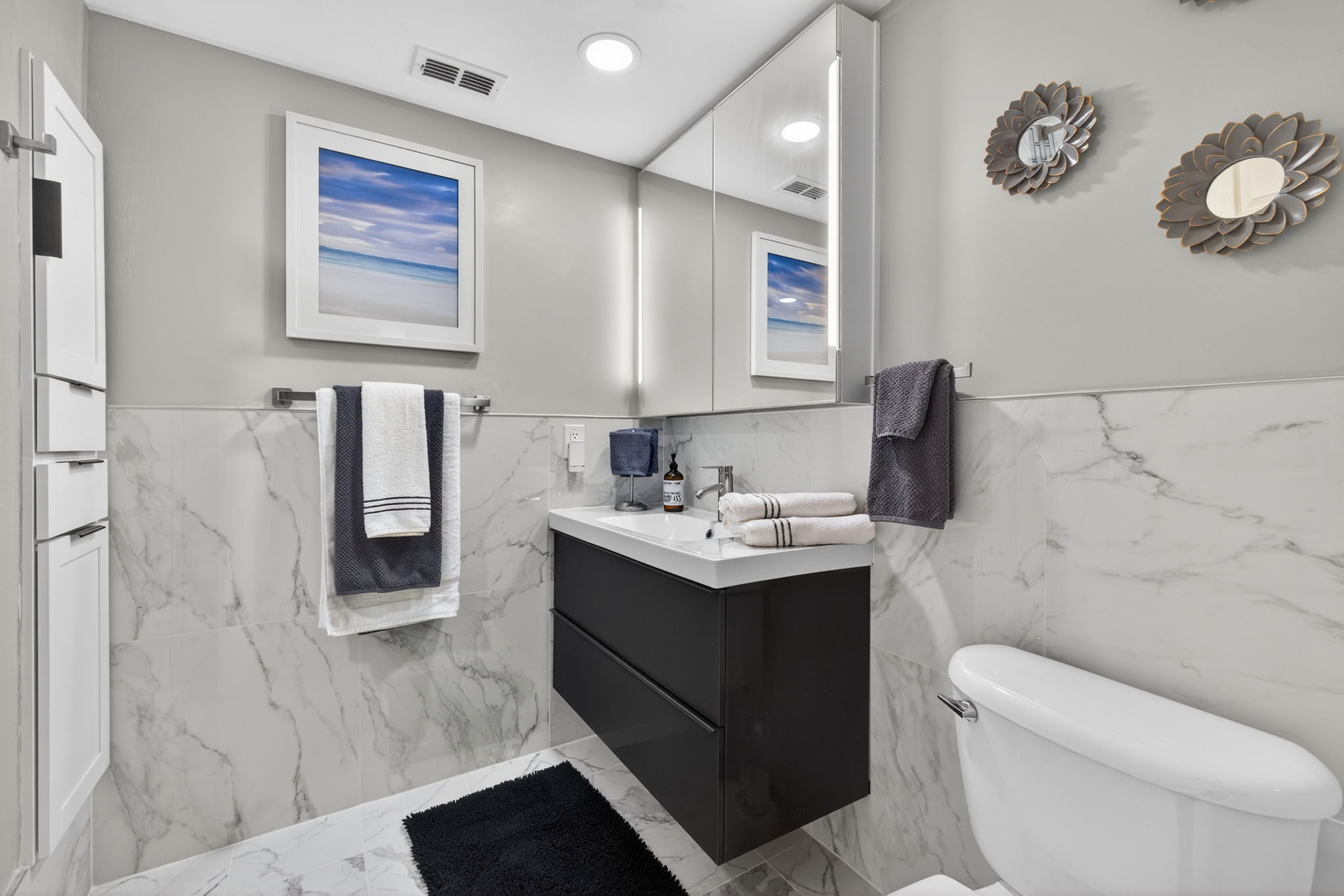 Guest bath by 2nd bedroom, quartz, rainshower