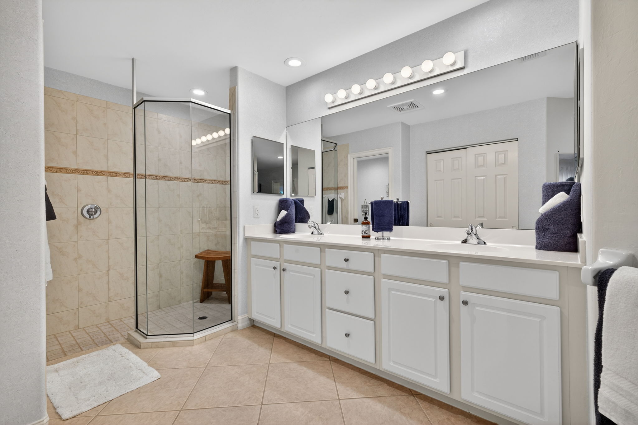 Oversize walk in shower, dual vanities