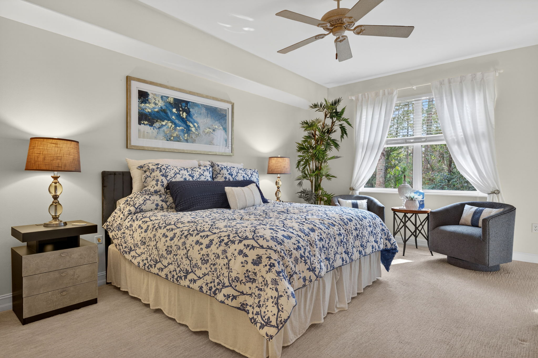 King size bed in sunny owner's suite