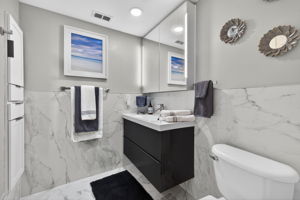 Guest bath by 2nd bedroom, quartz, rainshower