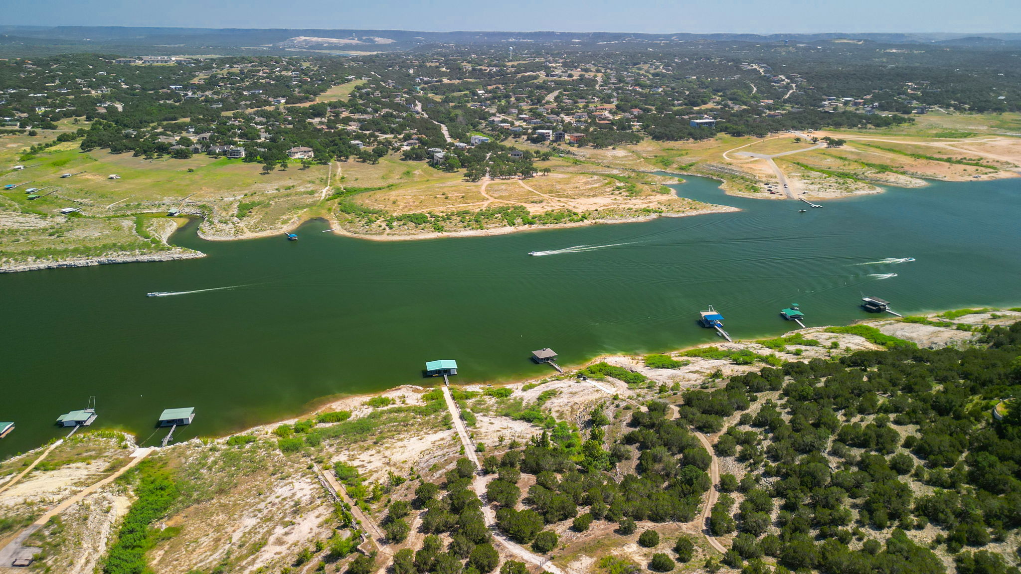 Perfect Location between Lakeway and Briarcliff. Your private boat dock is in the middle with a blue roof.  Lago Vista is across the lake.