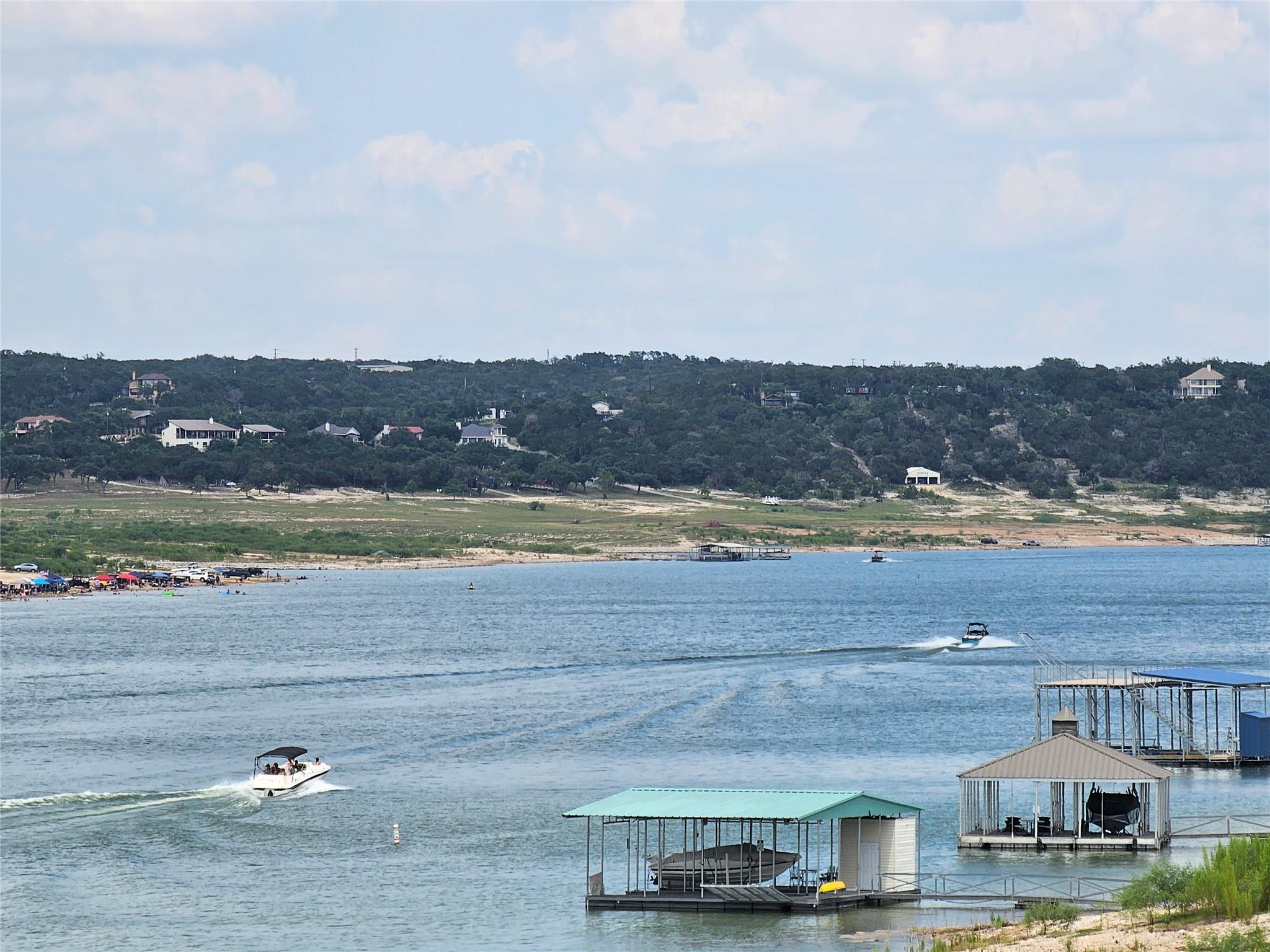 Your Blue Roof Boat Doc is in a good position with true waterfront on Lake Travis.