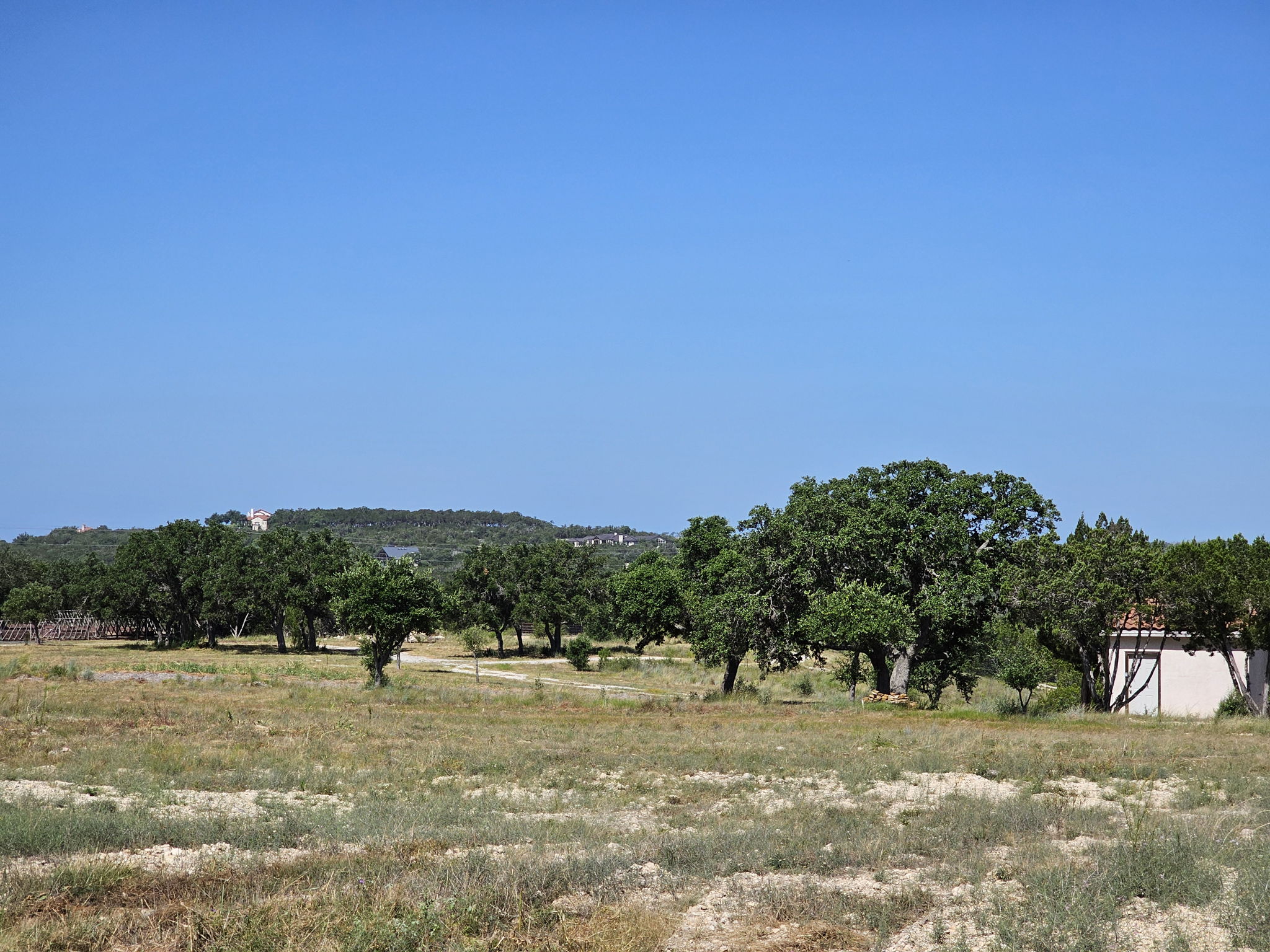 Multiple Building Sites are available on this beautiful acreage property.  One Well house is on the right.