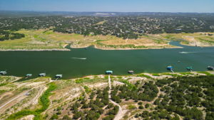 Follow the middle road to your boat dock.  No climbing stairs, a great rail system and a paved boat ramp are in place.