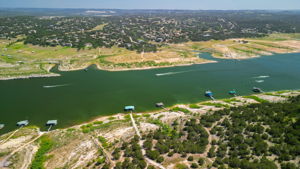 Perfect Location between Lakeway and Briarcliff. Your private boat dock is in the middle with a blue roof.  Lago Vista is across the lake.