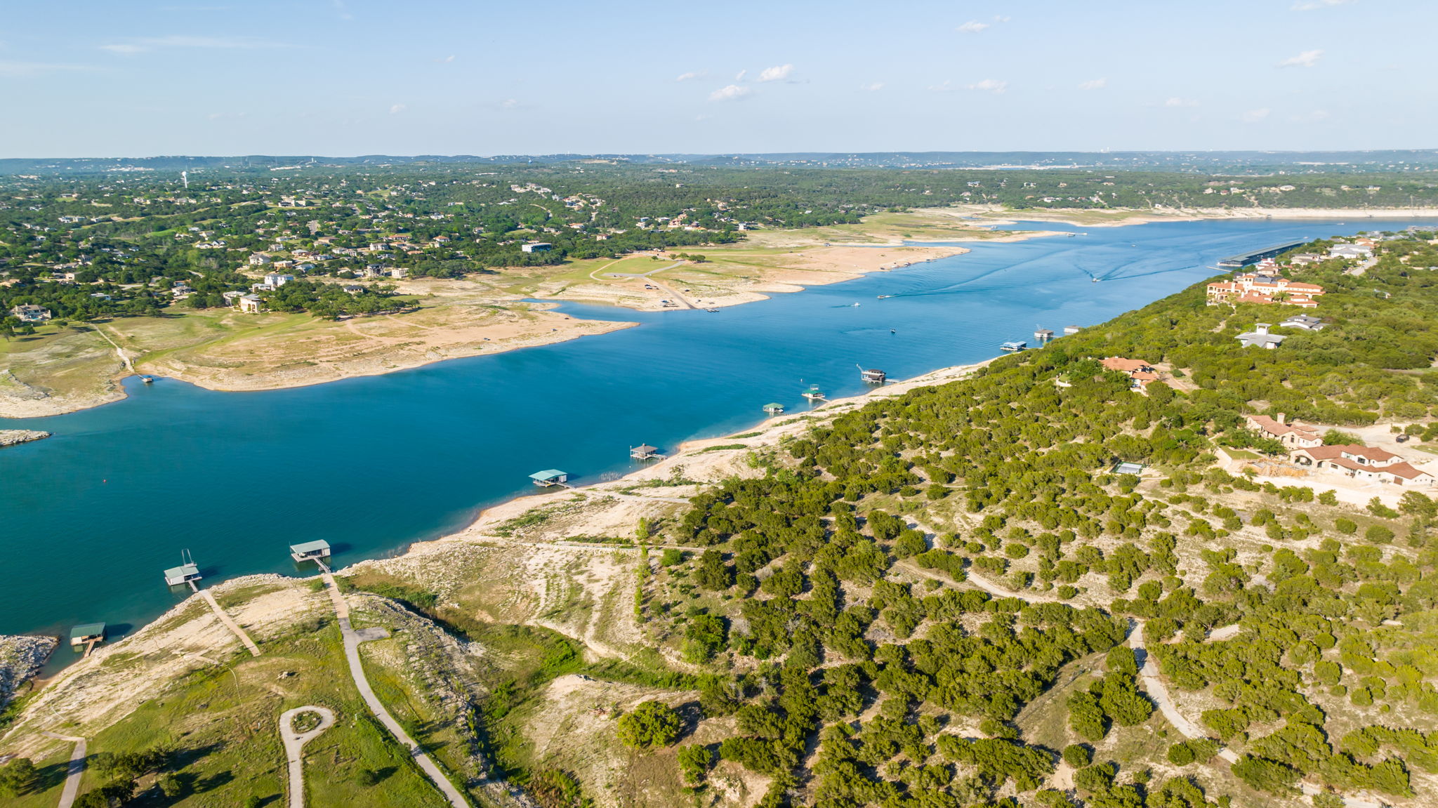 Aerial View of Lake Travis going towards the Reserve and Lakeway with Lago Vista across the lake.
