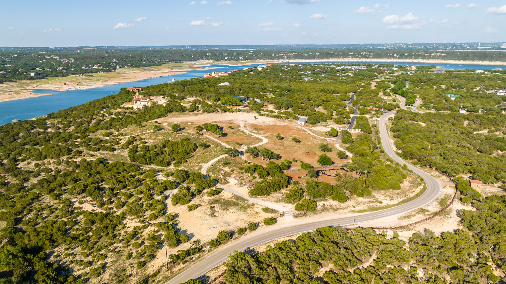 Imagine your new home on this 23.85 acreage property with South Shore Lake Travis access (about 500 feet of waterfront). The partially cleared area would be ideal to capture those panoramic views.