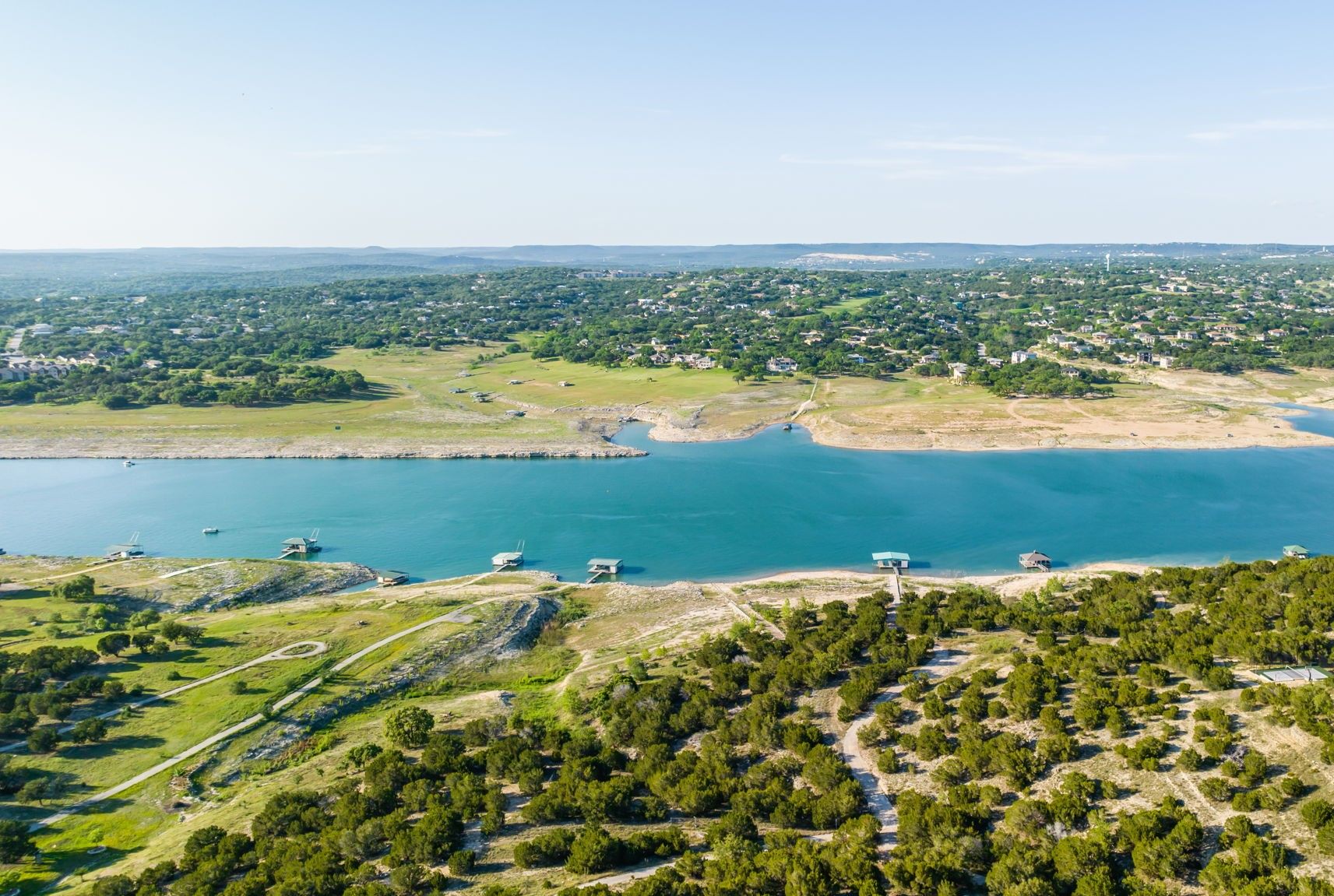 Great setting on the South Shore of Lake Travis with open and deep water. Even with the current water levels, boat docks are in good water. Boat is not included.oat dock (green roof). Good depth of water for boat dock.