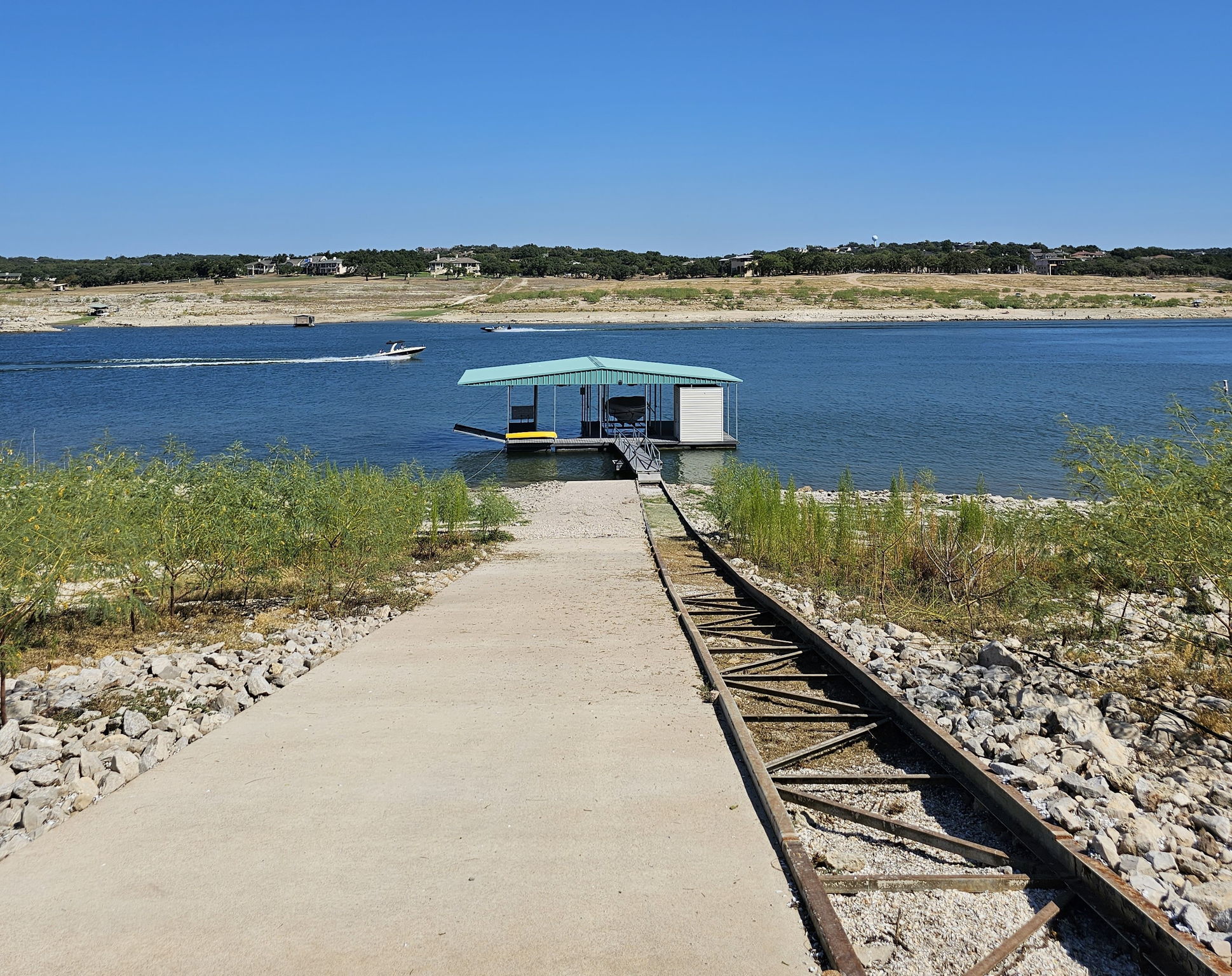 Your boat dock with the rail system on the right. You will not have to worry about the water levels.