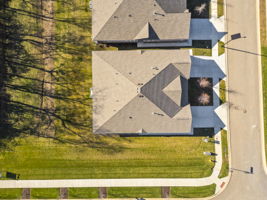 Above view of this villa. Look at the space to the side of the home!