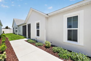 Screened Front Porch Entry with PRIVATE Side Yard