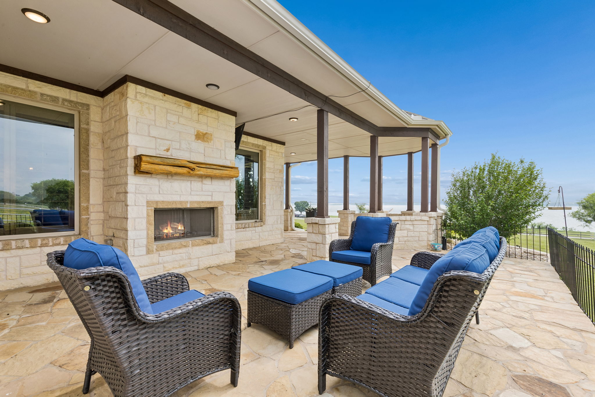 Lovely sitting area with fireplace, television and outlets for a hot tub. This area is accessed from a door in the primary suite.