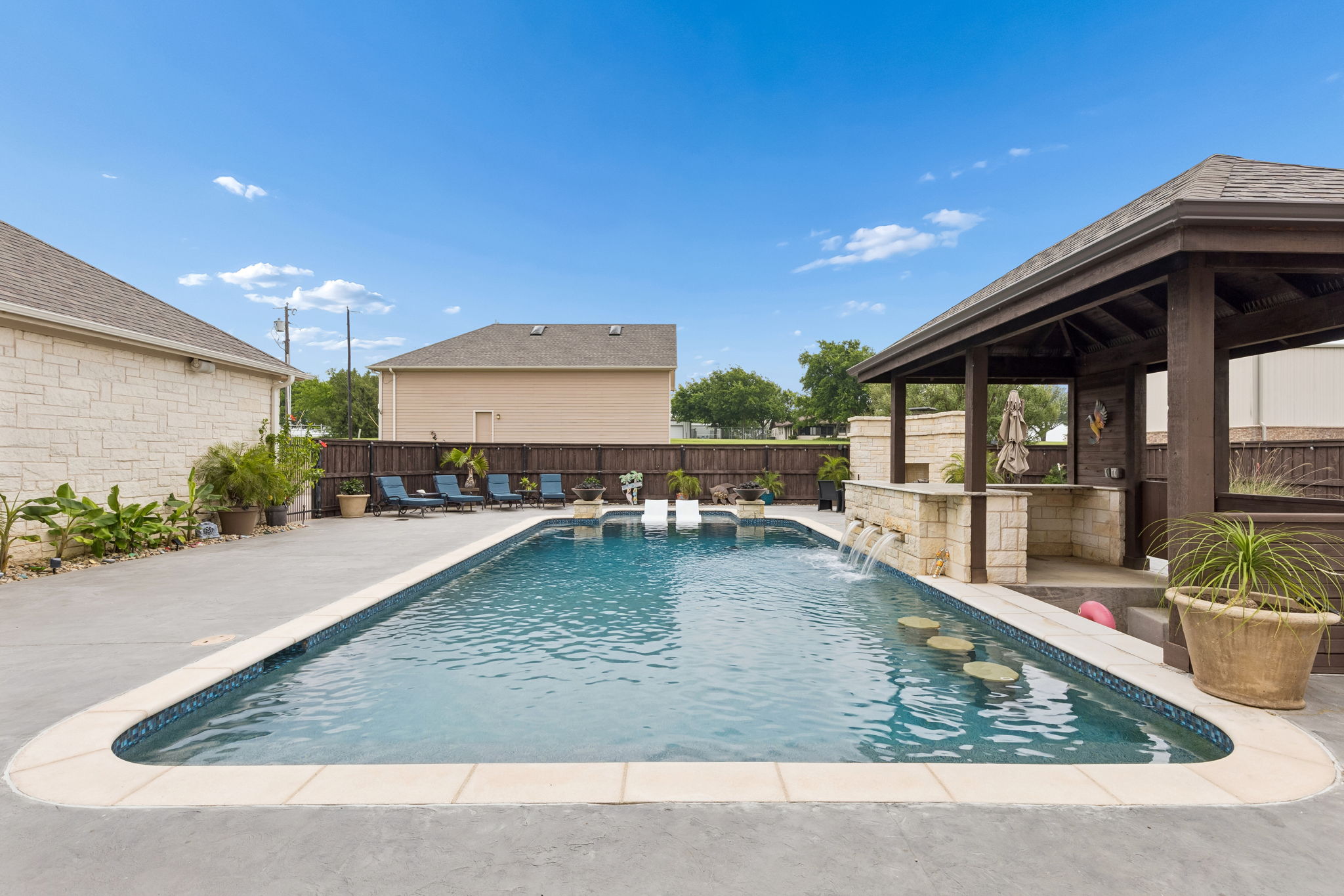 The swim-up bar and plenty of area for activities.