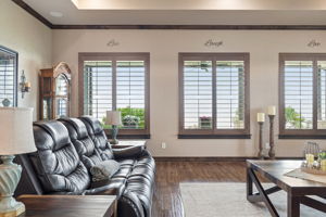 Energy efficient wall of windows provide natural art to this space as the view changes throughout the day and season.