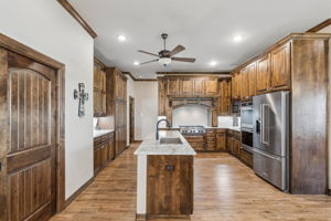 The door on the left open up to a huge walk-in kitchen pantry.
