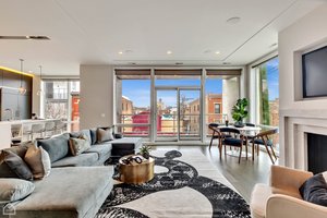 Living Room - with floor to ceilign Pella windows and patio doors