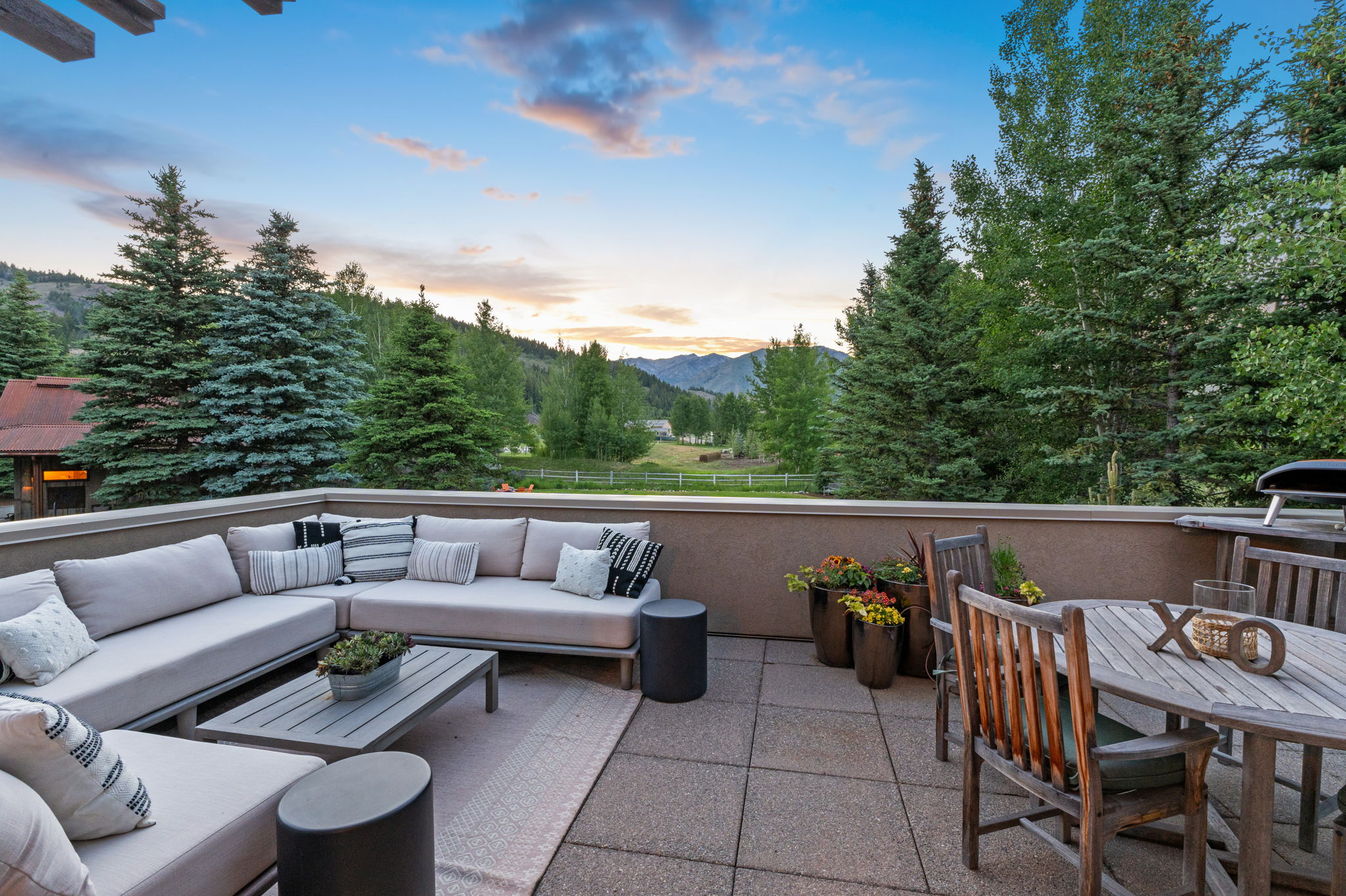 Large deck off of living area with heated pavers