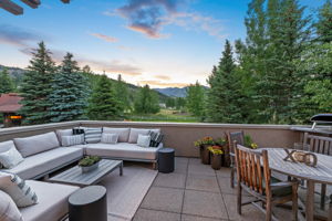 Large deck off of living area with heated pavers